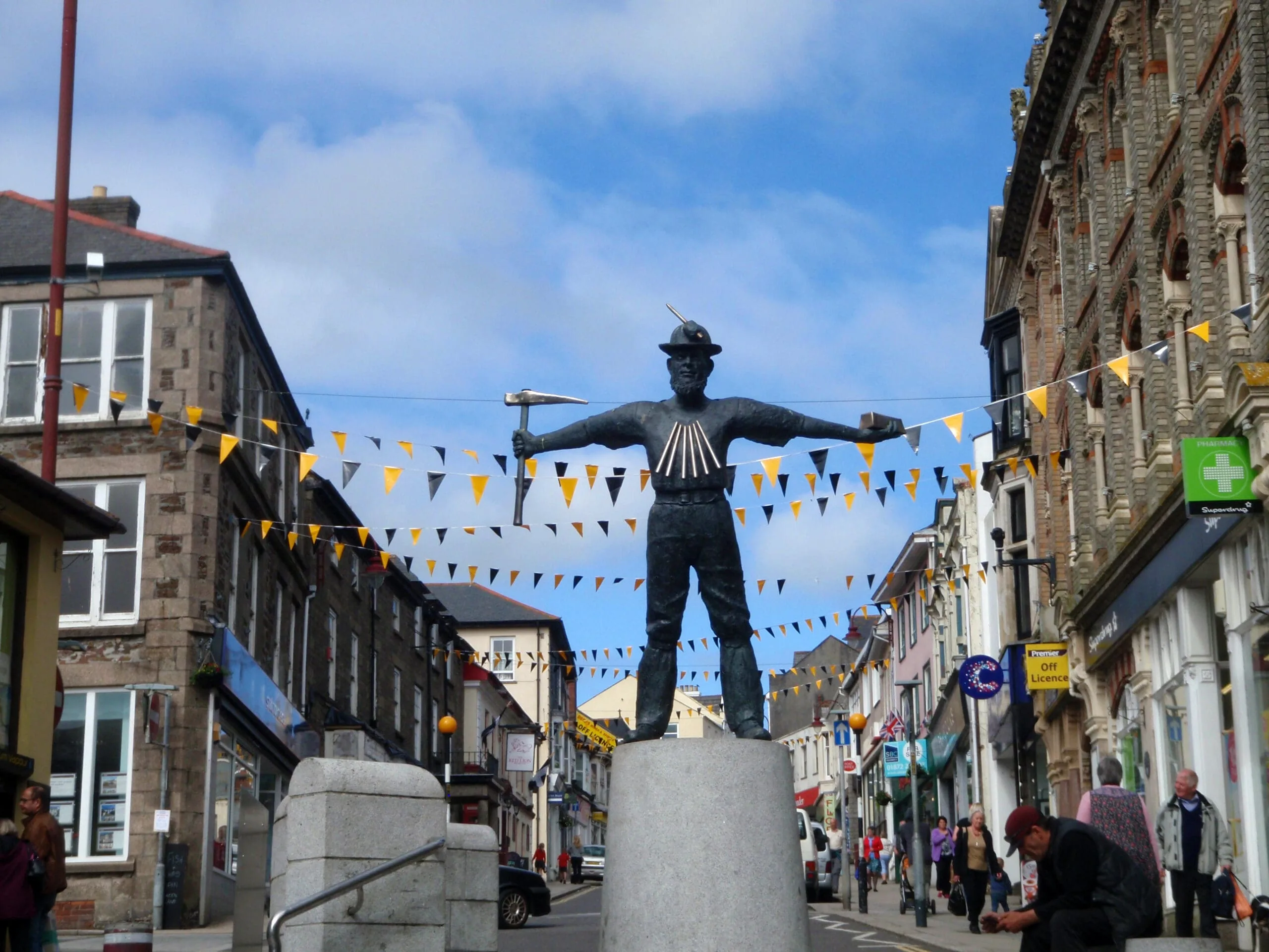 A bronze statue of a Cornish miner (erected 2008), Fore Street, Redruth, Cornwall