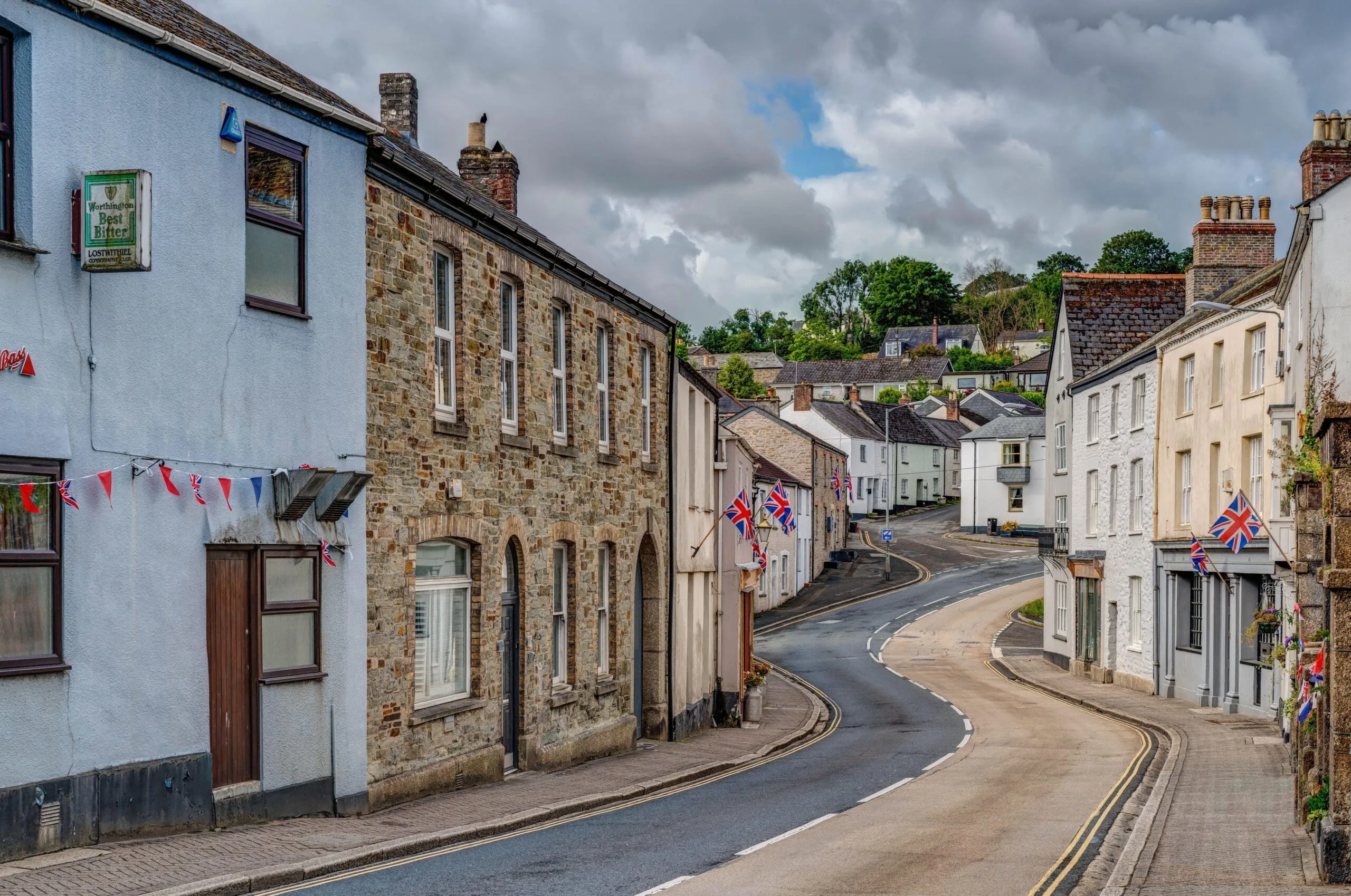 A sunny landscape of the main road passing through the small town of Lostwithiel, Cornwall.