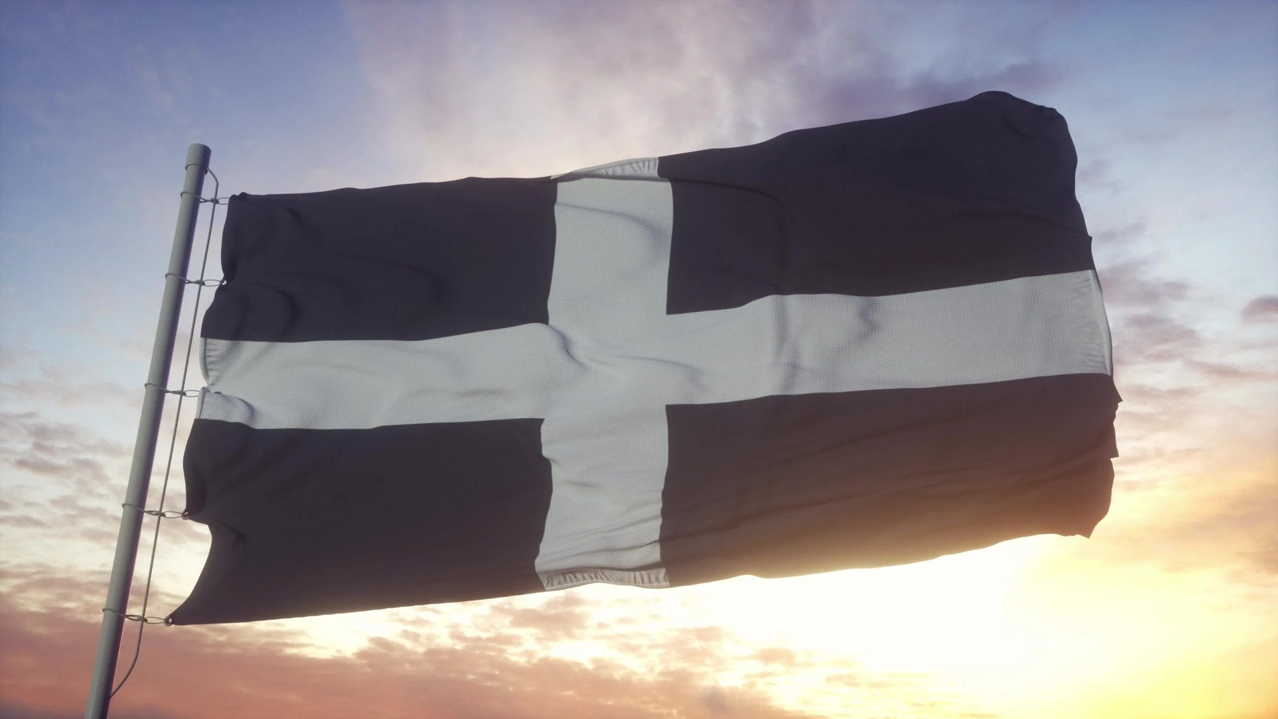 The Cornwall flag, waving in the wind on a sunny afternoon